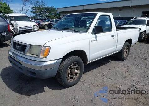 1999 Nissan Frontier Xe z USA, uszkodzony, nr VIN 1N6DD21S8XC318584